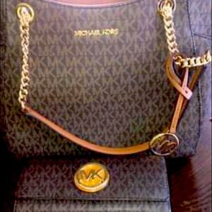 New MK purse with matching wallet.